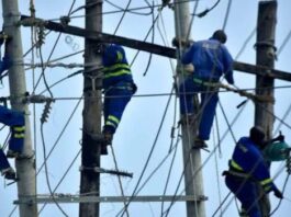 Kenya Power technicians conducting planned network maintenance" or "KPLC electricians repairing power lines